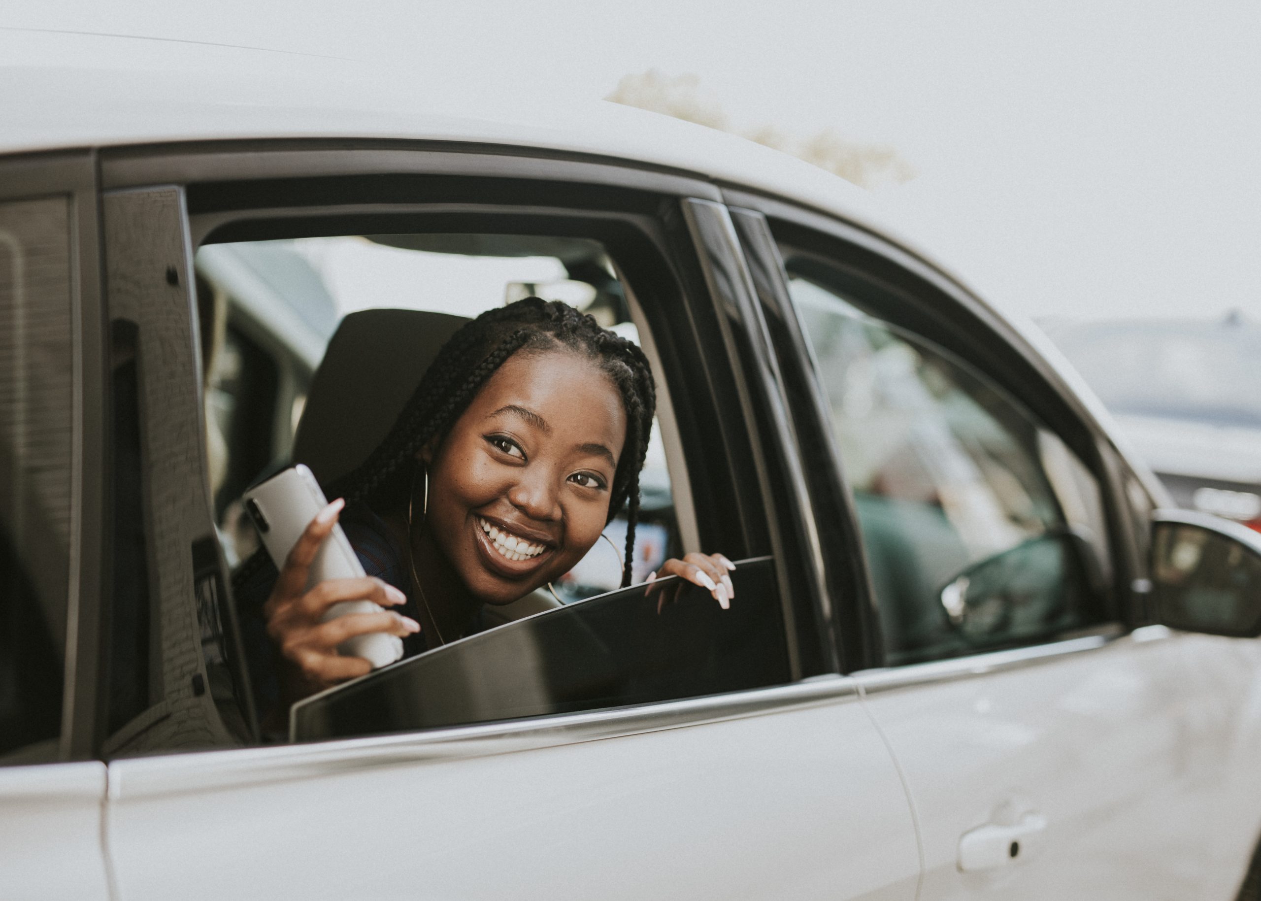 woman-riding-a-car